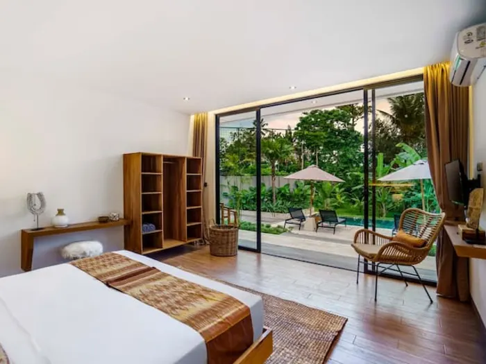 A premium private room with a pool view at the villa