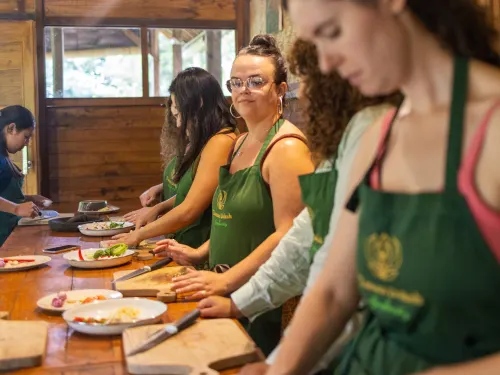 Guests in aprons at the Balinese cooking class